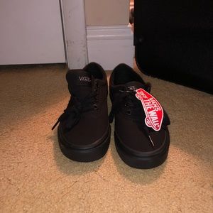Brand new, never worn. All black womens Vans